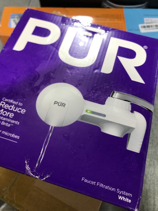 Photo 1 of PUR Horizontal Faucet Mount Water Filtration System with Lead Reducing Filter for Cleaner, Filtered Tap Water, Lasts 100 Gallons, Sink Water Filter, Fits Most Kitchen or Bathroom Faucets, White