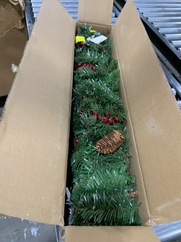 Photo 1 of National Tree Company Pre-Lit Artificial Christmas Garland, Green, Crestwood Spruce, White Lights, Decorated with Glitter, Pinecones, Berry Clusters, Battery Operated, Christmas Collection, 9 Feet
