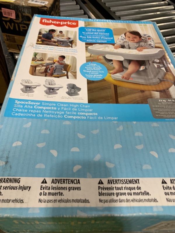 Photo 1 of Fisher-Price SpaceSaver High Chair Navy Foliage, portable infant-to-toddler dining chair and booster seat with easy clean up features