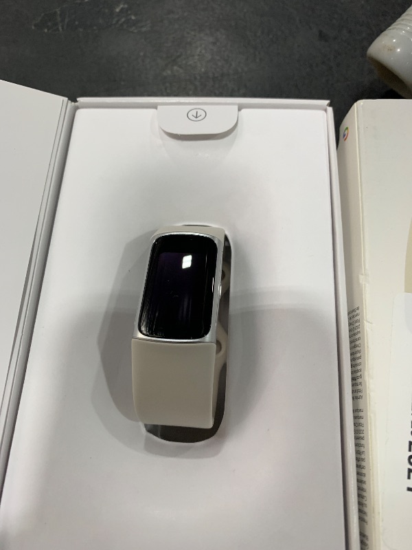Photo 1 of Fitbit Charge 6 Fitness Tracker with Google apps, Heart Rate on Exercise Equipment, 6-Months Premium Membership Included, GPS, Health Tools and More, Porcelain/Silver, One Size (S & L Bands Included)