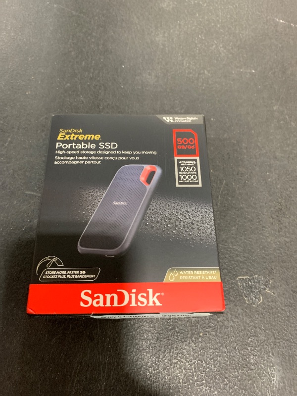 Photo 1 of SanDisk 500GB Extreme Portable SSD - Up to 1050MB/s, USB-C, USB 3.2 Gen 2, IP65 Water and Dust Resistance, Updated Firmware - External Solid State Drive - SDSSDE61-500G-G25
