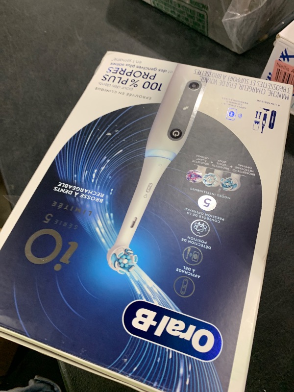 Photo 1 of Oral-B iO Deep Clean + Whiten Rechargeable Electric Toothbrush with Visible Pressure Sensor, 2 Minute Timer, 5 Cleaning Settings, 1 iO5 Limited, 3 Toothbrush Heads, Travel Case & Refill Holder, White