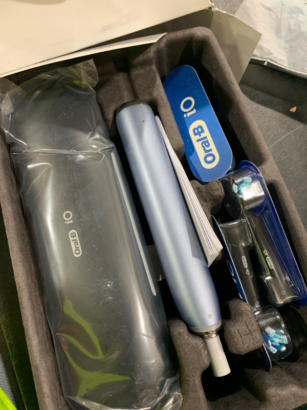 Photo 1 of Oral-B iO Series 9 Electric Toothbrush with 4 Brush Heads, Aqua Alabaster