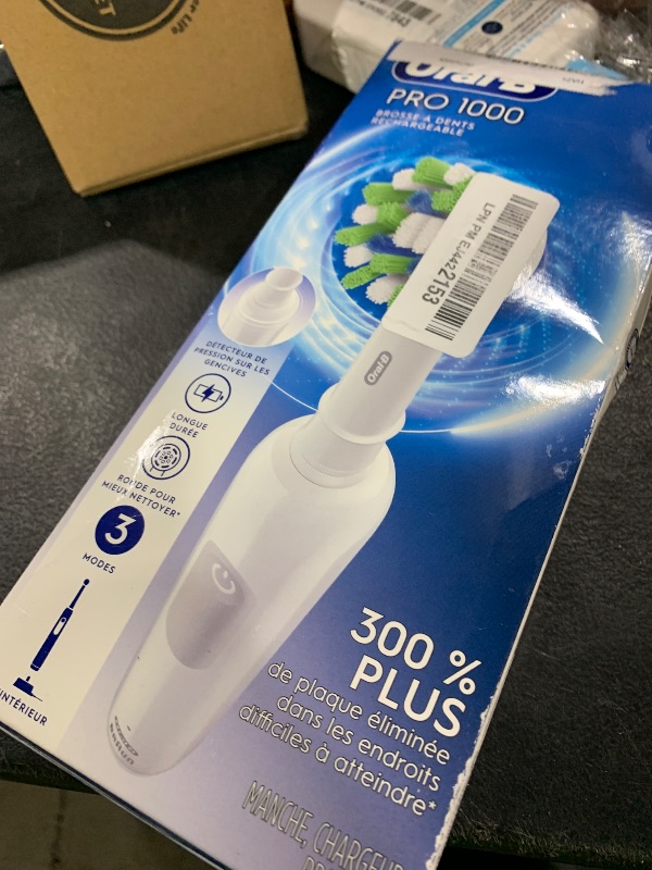 Photo 1 of Oral-B Pro 1000 Rechargeable Electric Toothbrush, White