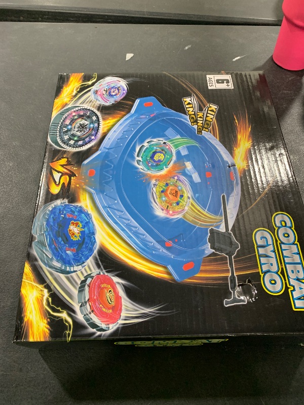 Photo 1 of BUPASAK Light Ignite Spinning Tops Battle Set, with Stadium, 6 Light Ignite Spinning Tops, and 2 Launchers, Toys for 6 Year Old Boys & Girls & Up (Amazon Exclusive)