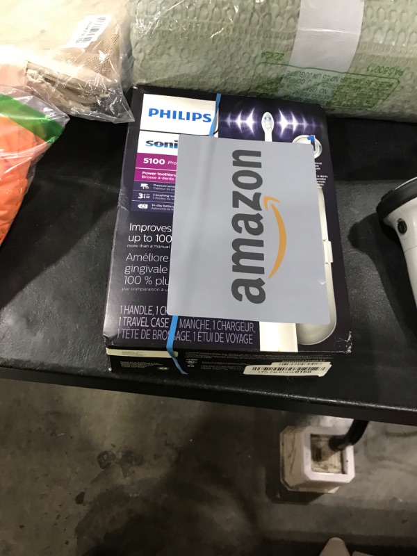 Photo 1 of Philips Sonicare ProtectiveClean 5100 Rechargeable Electric Toothbrush, with Pressure Sensor, 3 Cleaning Modes, SmarTimer and QuadPacer, 14-Day Battery Life, Travel Case, White, Model HX6857/11