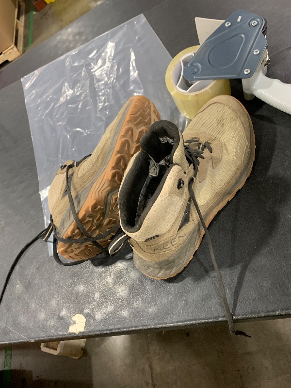 Photo 1 of used size 9.5 generic shoes 