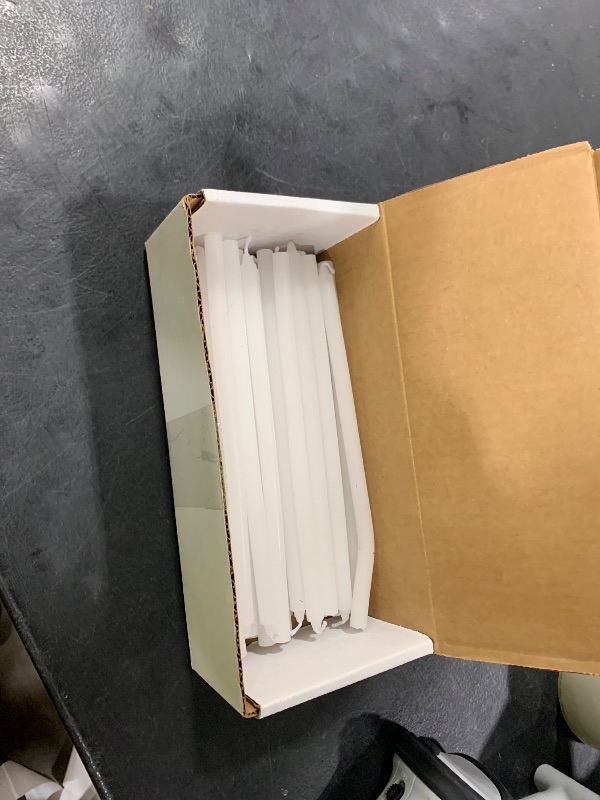 Photo 1 of Church Service Ceremony Candlelight Vigil 8 1/2" H x 1/4" Dia Polar Candles with Paper Drip Protectors - 50 Per Box