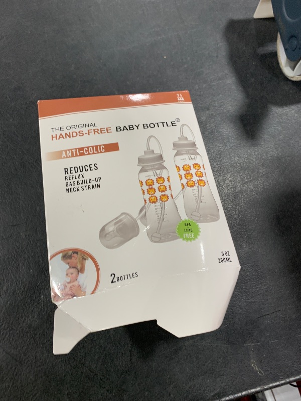 Photo 1 of Hands-Free Baby Bottle - Anti-Colic Nursing System 9 oz Baby Bottle with Fast Flow Nipple/Teat 3m+ Infant with Tube Straw Feeding System for Toddler (2 Bottles - Lion)