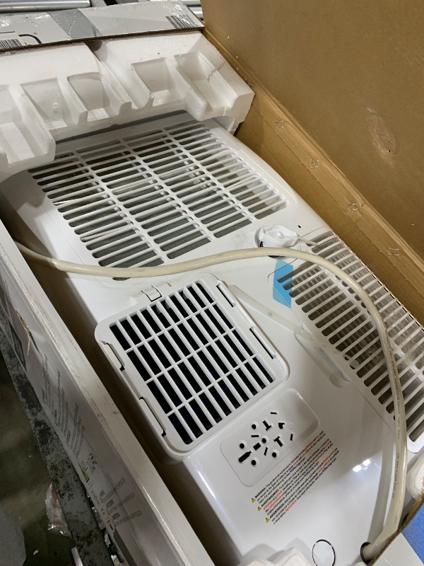 Photo 1 of BLACK+DECKER Smart Portable Air Conditioner, 14,000 BTU (10,200 BTU SACC) for Rooms up to 700 Sq. Ft., Smart Portable AC with Follow Me Remote and Window Kit, BPACT14WT, White
