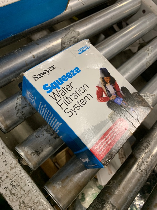 Photo 1 of Sawyer Products SP129 Squeeze Water Filtration System w/ Two 32-Oz Squeeze Pouches, Straw, and Hydration Pack Adapter