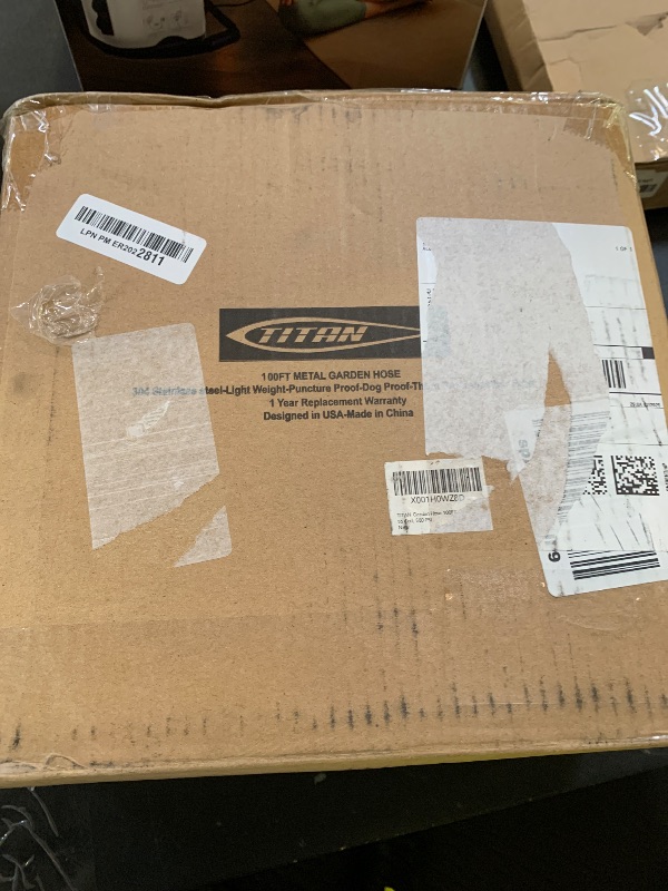 Photo 1 of TITAN Garden Hose 100FT - 304 Stainless Steel Metal Water Hose, Flexible, Kink-Free, Lightweight, Durable, Crush Resistant Fittings, Easy to Coil, 500 PSI