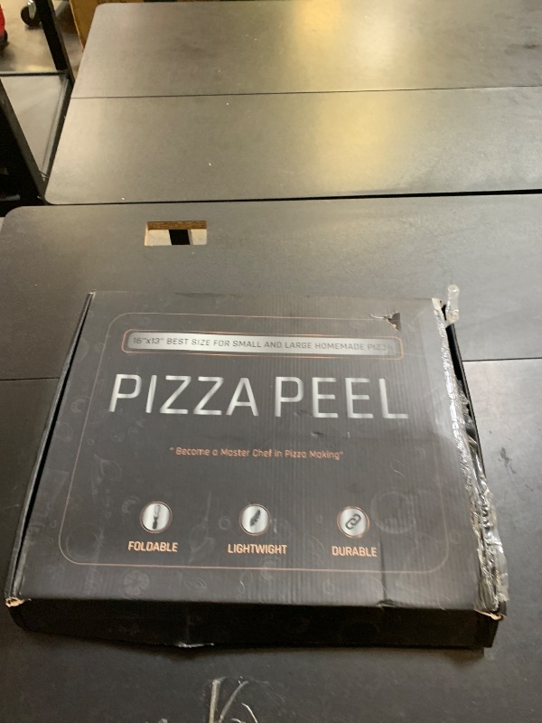 Photo 1 of KITCHUS MOON Large Pizza Peel 16 inch - Extra Large Metal Pizza Peel with 14 inch Stainless Steel Pizza Cutter Rocker, Pizza Paddle with Folding Handle (13"x16" with 14" Cutter)