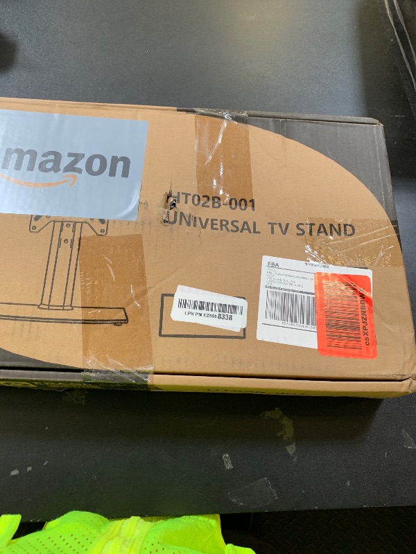 Photo 1 of Universal Swivel TV /Table Top TV Stand for 19 to 43 inch TVs with 90 Degree Swivel, 4 Level Height Adjustable, Heavy Duty Tempered Glass Base, Holds up to 99LBS HT02B-001