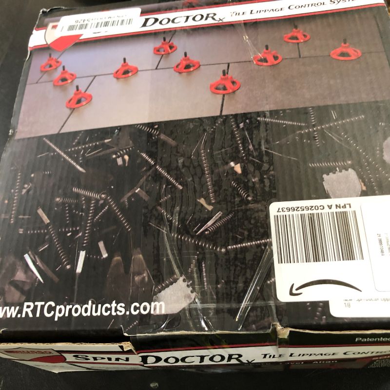 Photo 1 of Spin Doctor Lippage Control System 250 Starter Kit With 1/8 Base plates, Tile Leveling System 1/8