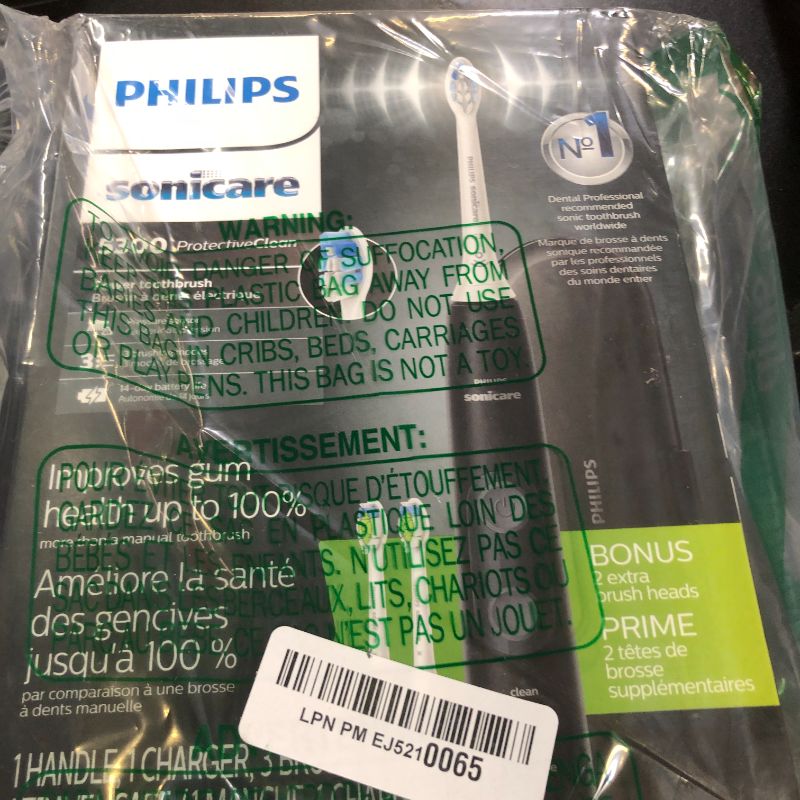 Photo 1 of Philips Sonicare ProtectiveClean 5300 Rechargeable Electric Toothbrush, with Pressure Sensor, 3 Cleaning Modes, SmarTimer and QuadPacer, with 2 Bonus Brush Heads, Travel Case, Black, Model HX6423/34