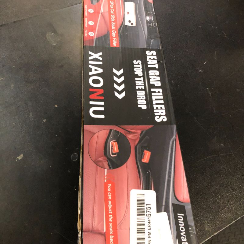Photo 1 of xiaoniu Car Seat Gap Filler Set of 2, Soft Foam Multifunctional Seat Gap Fillers with Seat Belt Holes, Universal Fit Car SUV Truck Gap Between The Seat and Console Stop Things Dropping