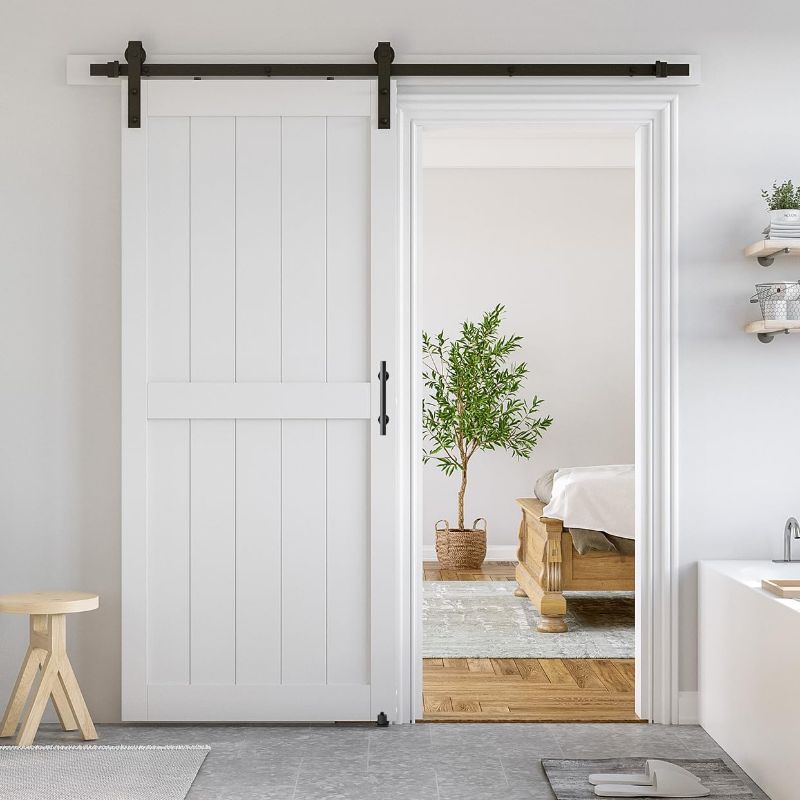 Photo 1 of SmartStandard 36 x 84 inch White Sliding MDF Barn Door with 6.6FT Black Sliding Door Hardware Kit & Handle, Pre-Drilled Ready to Assemble, Waterproof PVC Coating, H-Frame