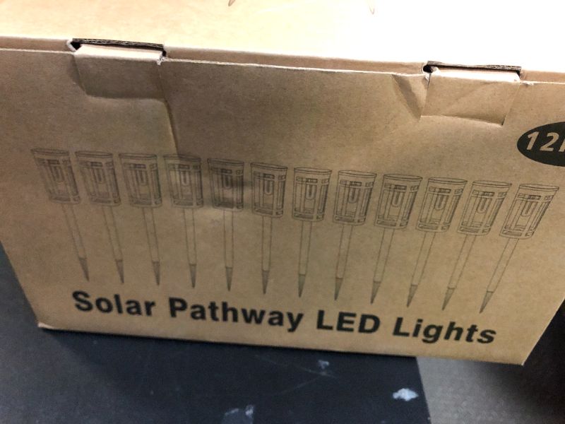 Photo 1 of EXCMARK 12 Pack Solar Lights Outdoor Waterproof for Garden Pathway Walkway Driveway Yard Lawn Decorative Landscape Lighting. (Warm White Light, 12)