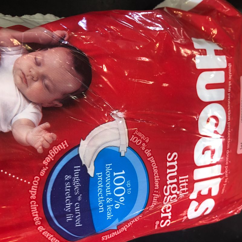 Photo 1 of Huggies Size Newborn Diapers, Little Snugglers Baby Diapers, Size Newborn (up to 10 lbs), 31 Count, Packaging May Vary