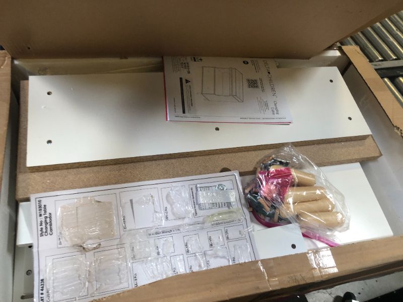 Photo 1 of Delta Children Essex Convertible Changing Table with Drawer, Bianca White/Natural