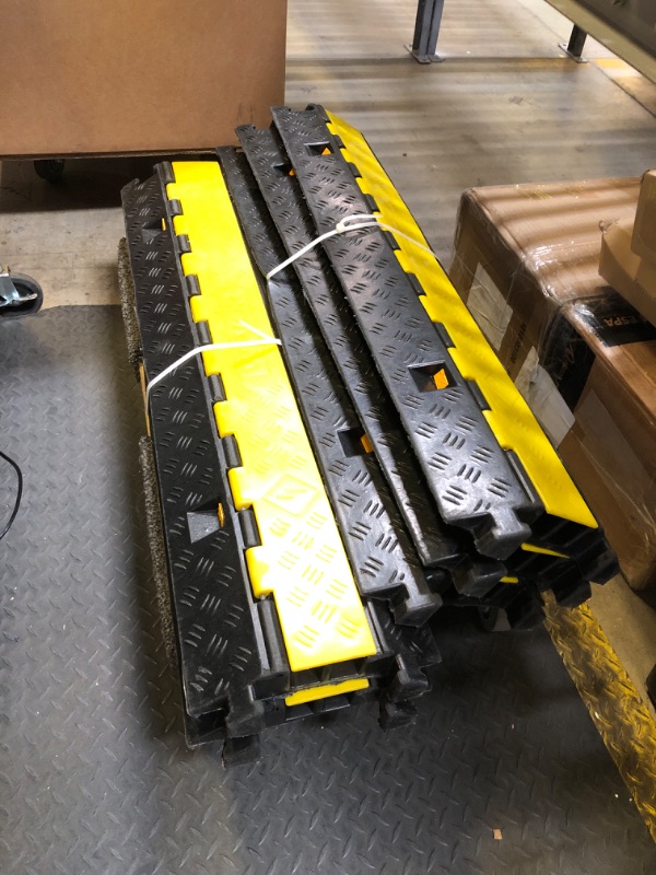 Photo 1 of VEVOR 5 Pack Rubber Cable Protector Ramp 2 Channel Heavy Duty 66,000 lbs Load Capacity Cable Wire Cord Cover Ramp Speed Bump Driveway Hose Cable Ramp Protective Cover (2-Channel, 5 Pack-66,000 lbs)