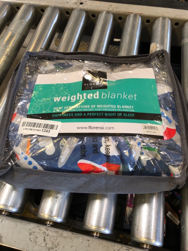 Photo 1 of Florensi Weighted Lap Pad for Kids, 5 lbs - Weighted Blanket for Kids, Teenagers, Boys, Girls - Soft, Warm, Comfortable - Sensory Weighted Lap Blanket & Calm Down Corner Supplies - 20" x 23"