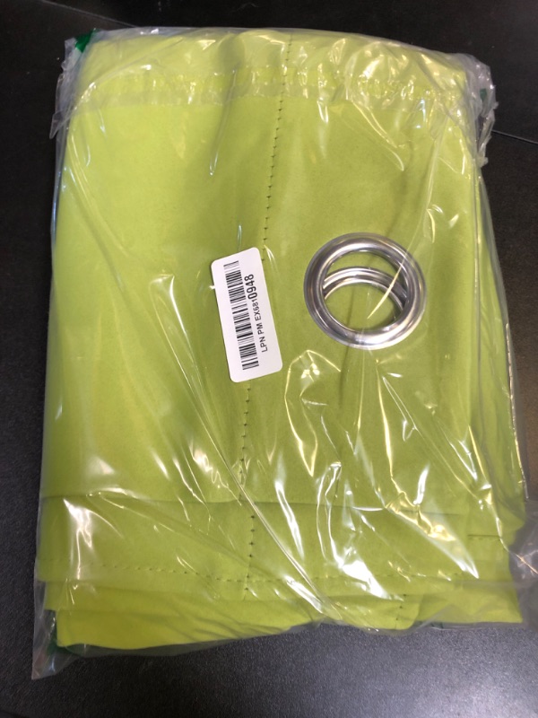 Photo 1 of NICETOWN Thermal Insulated Solid Grommet Top Blackout Holiday Decorative Curtains/Drapes for Kid's Room (1 Pair, 42 x 63 inches in Fresh Green)