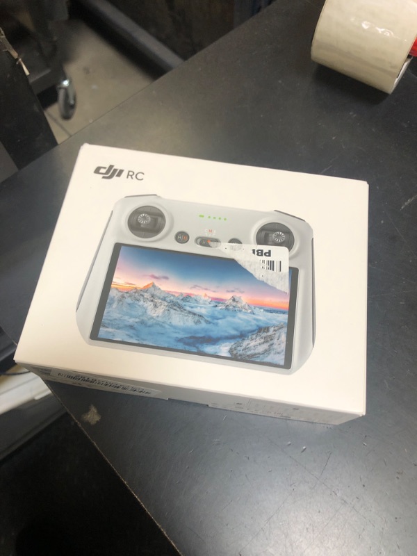 Photo 1 of DJI RC, Remote Controller with Lightweight Body, FHD Screen, 4hr Battery, Precision Control Sticks, O3+ Transmission