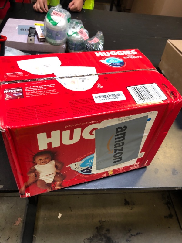Photo 1 of Huggies Size 1 Diapers, Little Snugglers Baby Diapers, Size 1 (8-14 lbs), 96 Count, Packaging May Vary