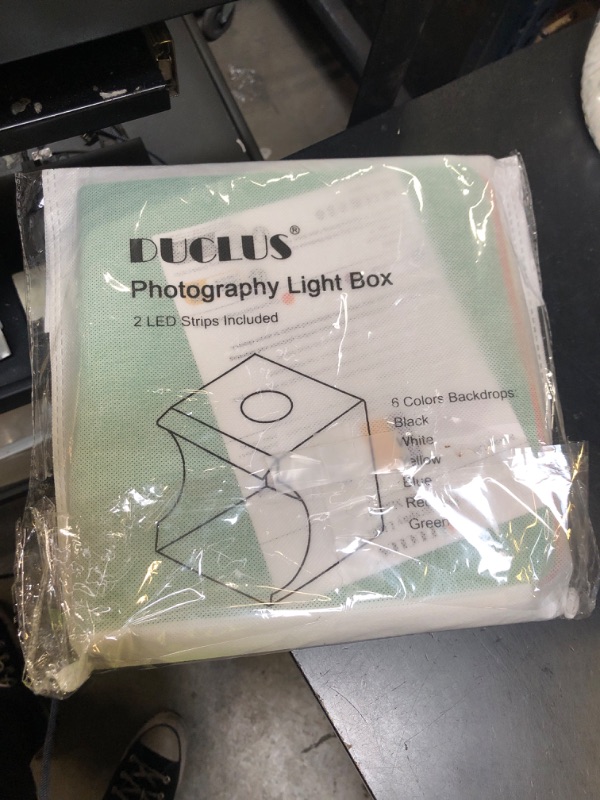 Photo 1 of DUCLUS Mini Photo Studio Light Box,Portable Folding Photography Light Tent kit with 40pcs LED Light + 6 Kinds Color Backgrounds for Small Size Products