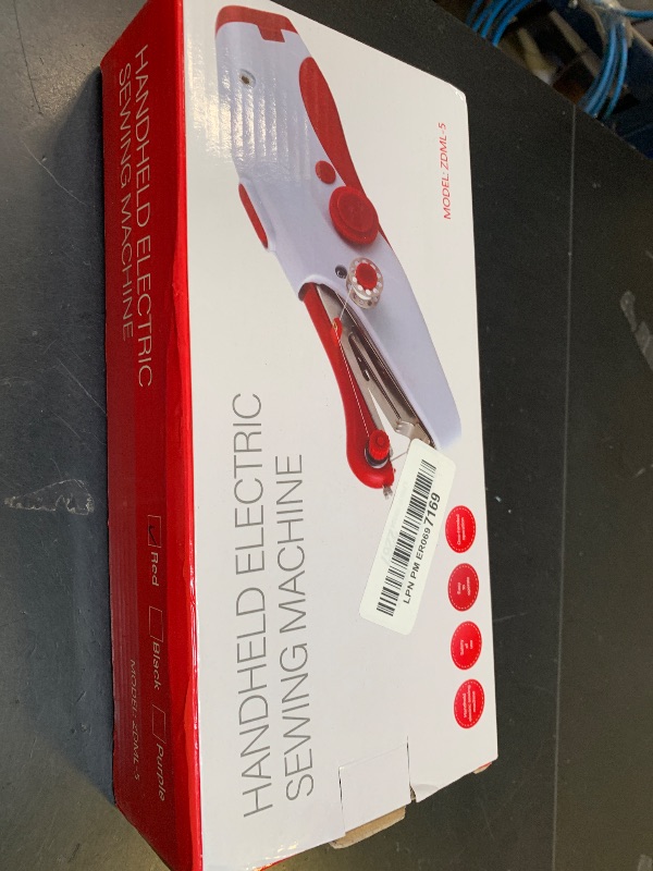 Photo 1 of Handheld Sewing Machine, Mini Portable Electric Sewing Machine for Beginners Adult, Easy to Use and Fast Stitch Suitable for Clothes,Fabrics, Cutains,DIY Home Travel(Red)
