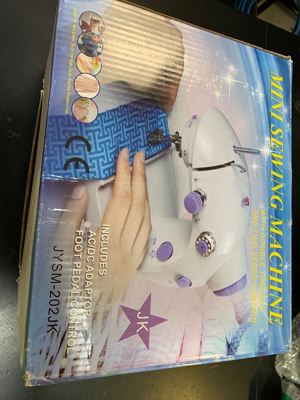 Photo 1 of Sewing Machine, 2 Modes Mini Sewing Machine for Beginners with Extension Table & Light, Portable and Easy to Use for DIY, Clothes, Home and Travel