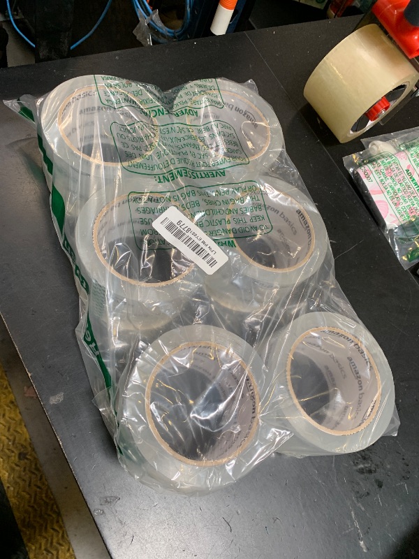 Photo 1 of Amazon Basics Extra-Wide Packing Tape, Designed for Moving, Storage and Packing, Shipping and Mailing, Extra-Wide 2.83"W, Crystal Clear, Low Odor, 6-Pack