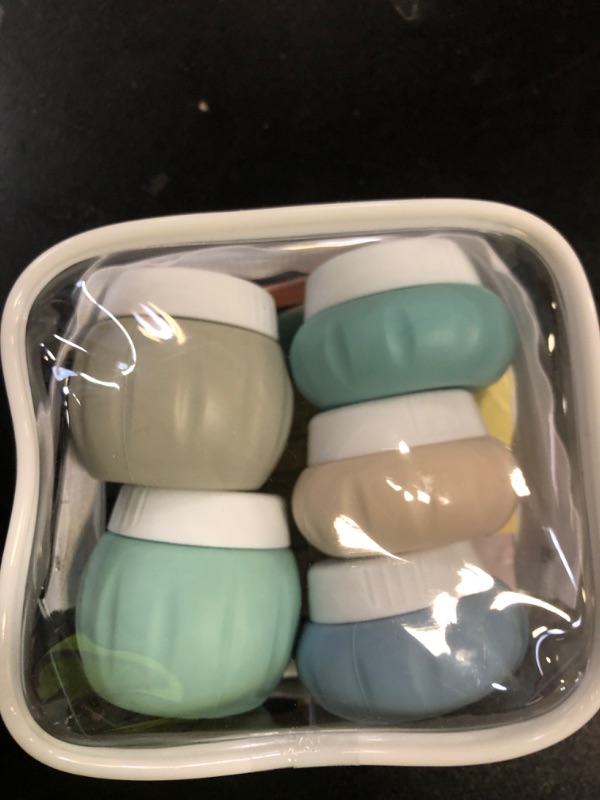 Photo 1 of GLAMFIELDS TSA Approved 2Pcs 1.7oz+3Pcs 1oz Travel Size Silicone Jars BPA Free, Leak-proof Travel Essentials with Lid for Cosmetic Face Hand Body Cream Green (5Pack)