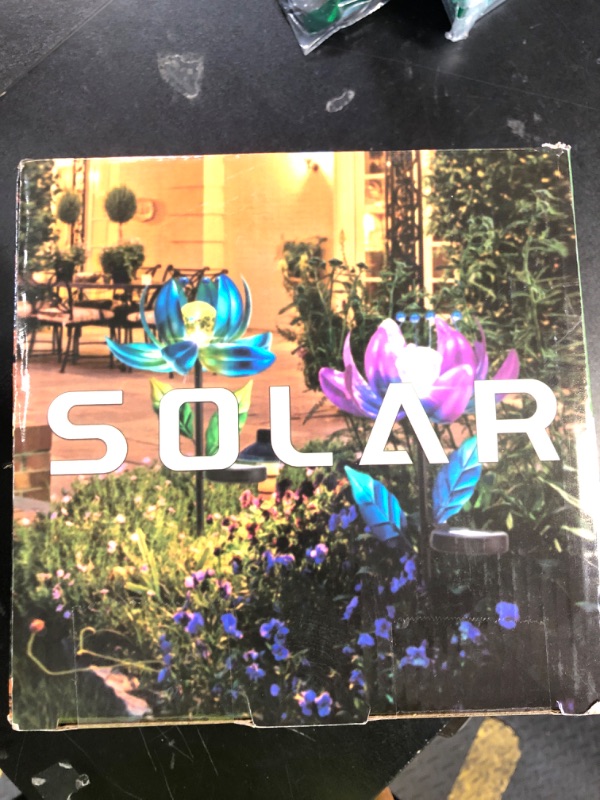Photo 1 of Solar Garden Lights Metal Flower Decor, Colorful Spinning Windmill Lotus Pathway Ligths with LED Cracked Crystal Ball Outdoor Decorative Stake Lighting Waterproof Flower Sculpture for Patio Yard
