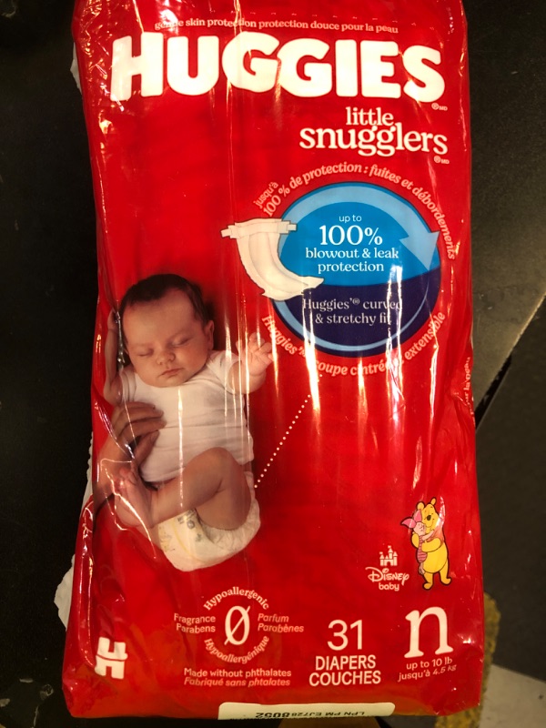 Photo 1 of Huggies Size Newborn Diapers, Little Snugglers Baby Diapers, Size Newborn (up to 10 lbs), 31 Count, Packaging May Vary