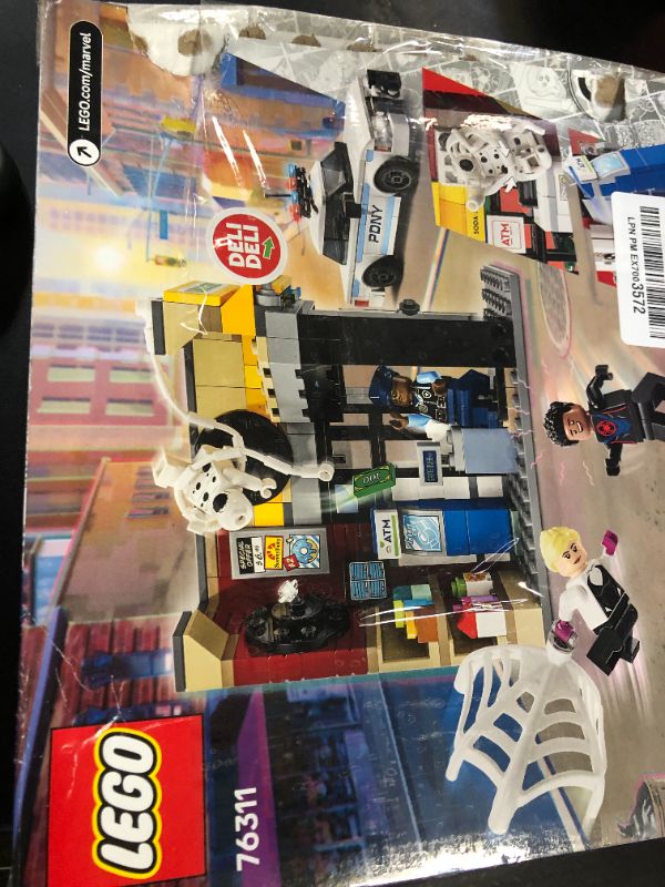 Photo 1 of LEGO Marvel Spider-Verse Miles Morales vs. The Spot Building Toy Set - Marvel Superhero Toy for Kids, Boys and Girls, Ages 9+ - with 4 Minifigures - Gift Idea for Birthday - 76311