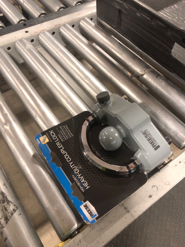 Photo 1 of Reese Towpower 7088300 Trailer Coupler Lock, Universal Fit, Heavy Duty, Designed to fit 1-7/8-in, 2-in, and 2-5/16-in couplers.