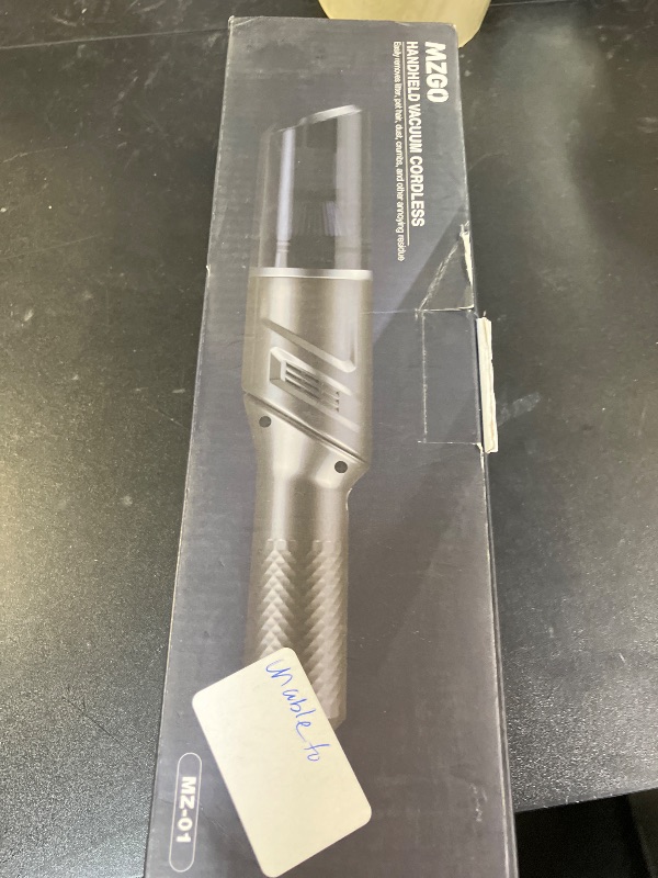 Photo 1 of HANDHELD VACUUM CORDLESS 