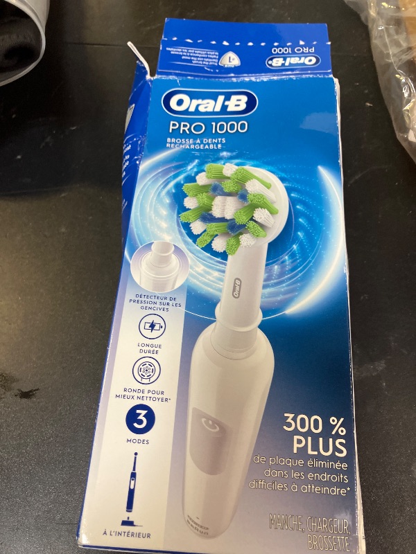 Photo 1 of Oral-B Pro 1000 Rechargeable Electric Toothbrush, White