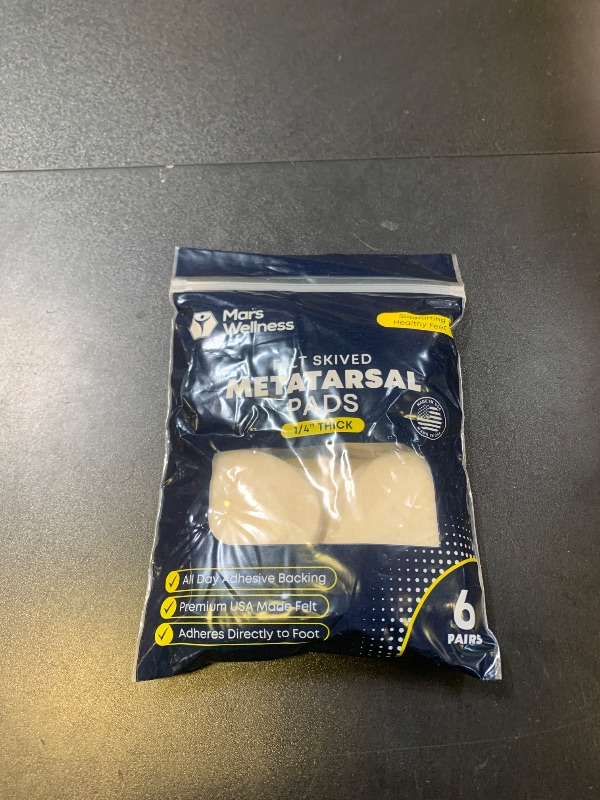 Photo 1 of Metatarsal Felt Foot Pad Skived Cut (1/4" Thick) - Made in USA - Felt Metatarsal Pads for Women and Men - Ball of Foot Cushion - 6 Pairs (12 Pieces)