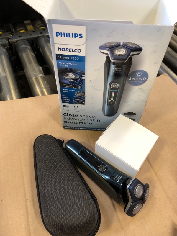 Photo 1 of Philips Norelco Shaver Series 7000, Wet & Dry Electric Shaver with SenseIQ Technology, Pop-up Trimmer, Charging Stand, Travel Case, UV Sanitizing Cube, Model S7889/91