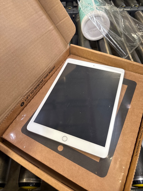 Photo 1 of Apple iPad (10.2-inch, Wi-Fi, 32GB) - Silver (Latest Model, 8th Generation) (Renewed)