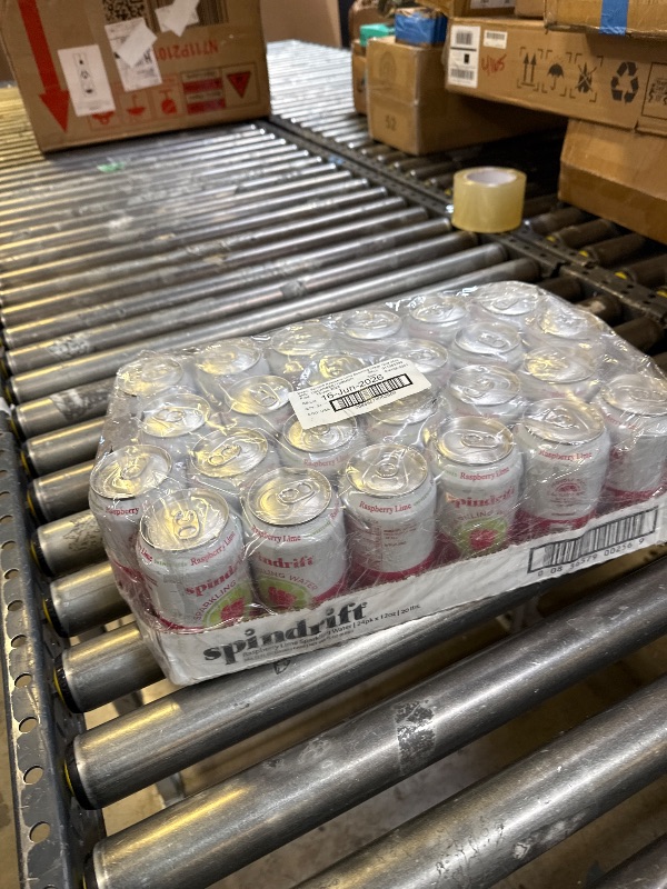 Photo 1 of Spindrift Sparkling Water, Raspberry Lime Flavored, Made with Real Squeezed Fruit, Only 9 Calories per Can, 12 Fl Oz Cans, Pack of 24