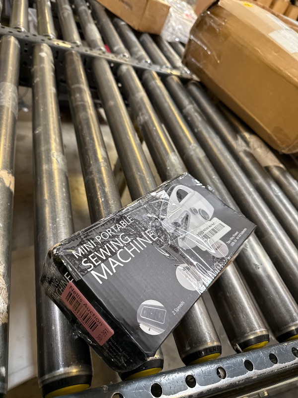 Photo 1 of Handheld Sewing Machine,Mini sewing machine,Easy to Use and Fast Stitch Suitable for Clothes, DIY Home Travel Electric Handheld Sewing Machine for Beginners.(black)