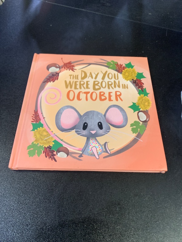 Photo 1 of The Day You Were Born In October: Gift book to celebrate the birth of a special little someone with facts for the child on their birth day. Hardcover 
