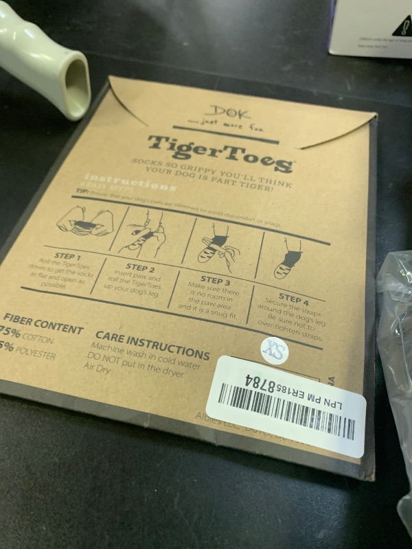 Photo 1 of DOK TigerToes Premium Non-Slip Dog Socks for Hardwood Floors - Extra-Thick Grip That Works Even When Twisted - Prevents Licking, Slipping, and Great for Dog Paw Protection (X-Small)