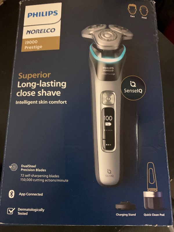 Photo 1 of Philips Norelco Shaver i9000 Prestige, Wet & Dry Electric Shaver, Dark Slate Nova, SenseIQ Technology, Triple Lift & Cut System, 360 Rotating Dual SteelPrecision Blades, Charging Stand, XP9204/85