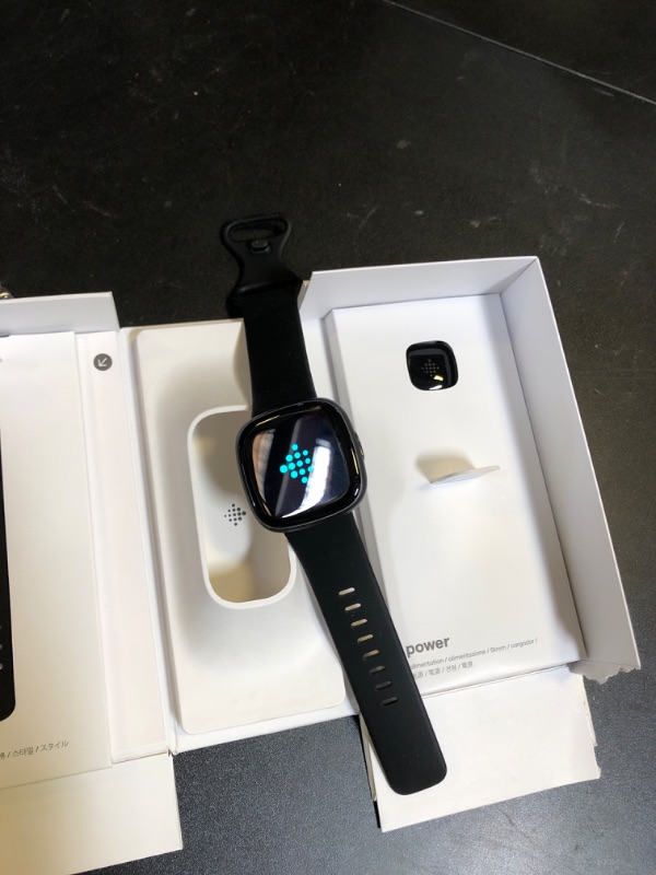 Photo 1 of Fitbit Versa 4 Fitness Smartwatch with Daily Readiness, GPS, 24/7 Heart Rate, 40+ Exercise Modes, Sleep Tracking and more, Black/Graphite, One Size (S & L Bands Included)